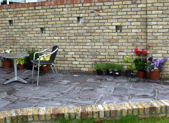 Reclaimed brick supplied for patio wall