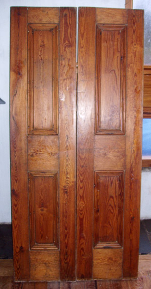Pair pitch pine paneled doors hand finished