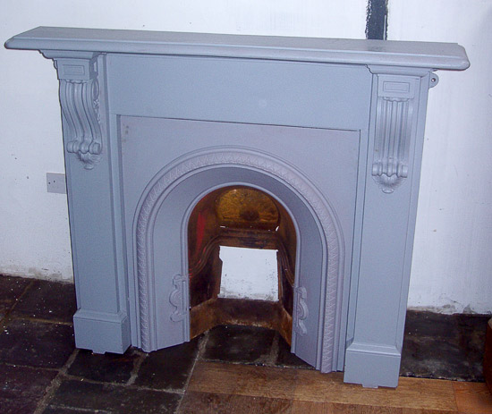 Cast iron fireplace with insert